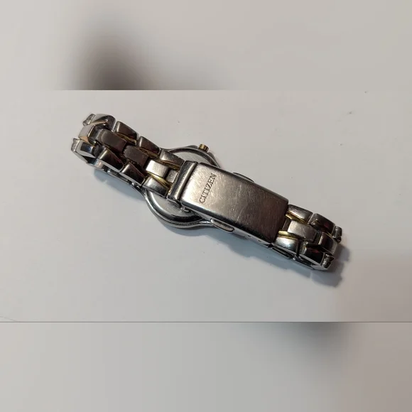 Citizen Wristwatch Silver & Gold Tone Stainless Steel Band Wr 100